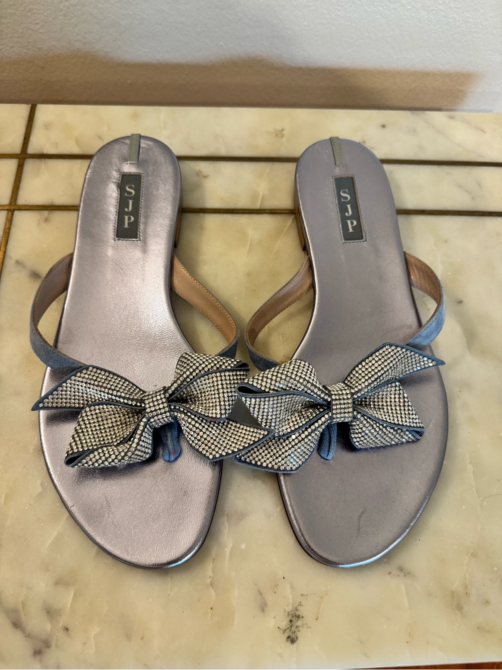 SJP by Sarah Jessica Parker Silver/Ice Blue Metallic Bow Thong Sandals